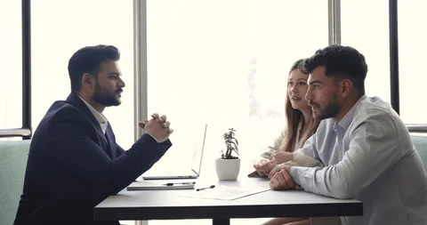 Friendly consultant helping with home loan application